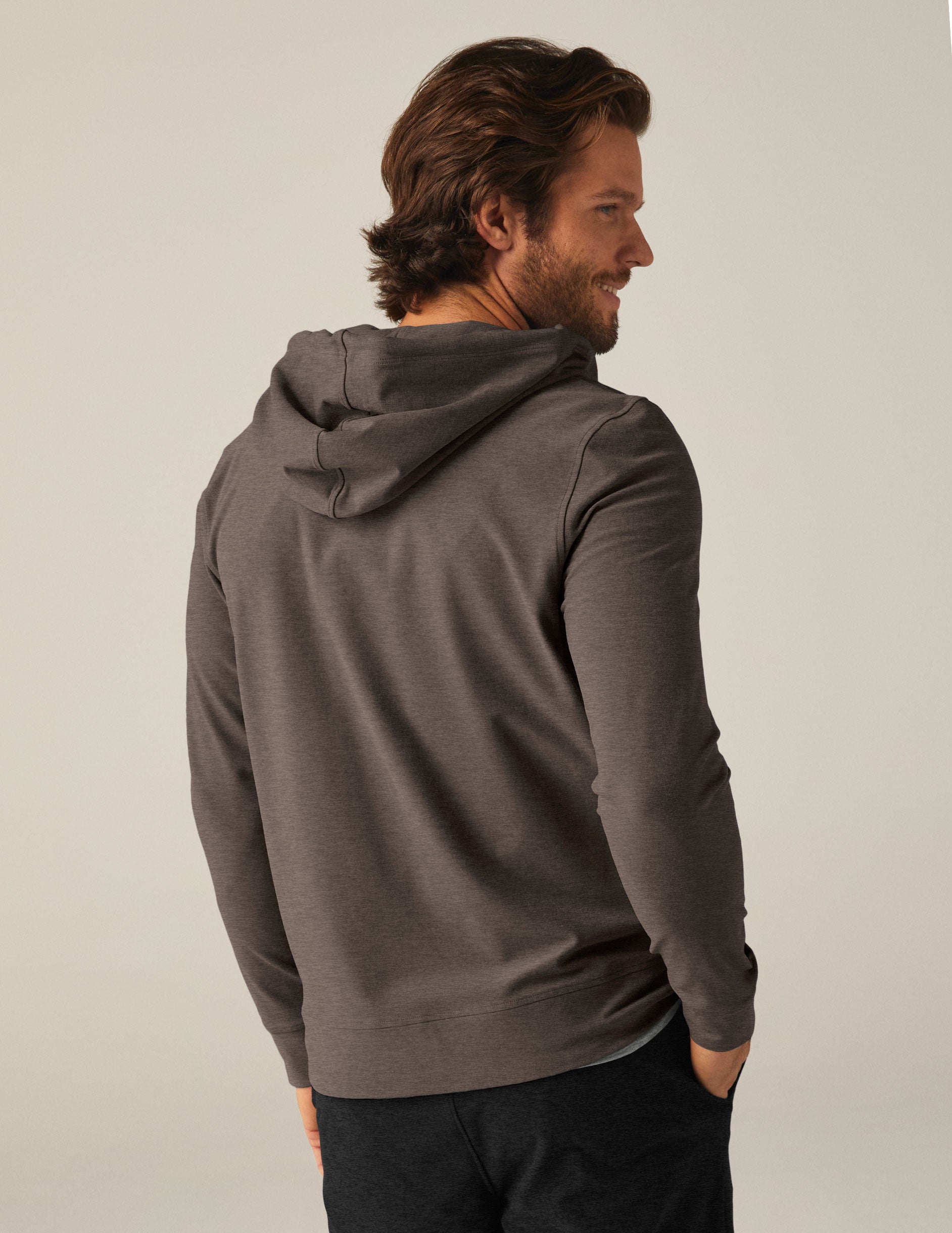 brown men's zip-up jacket with a hood and pockets.