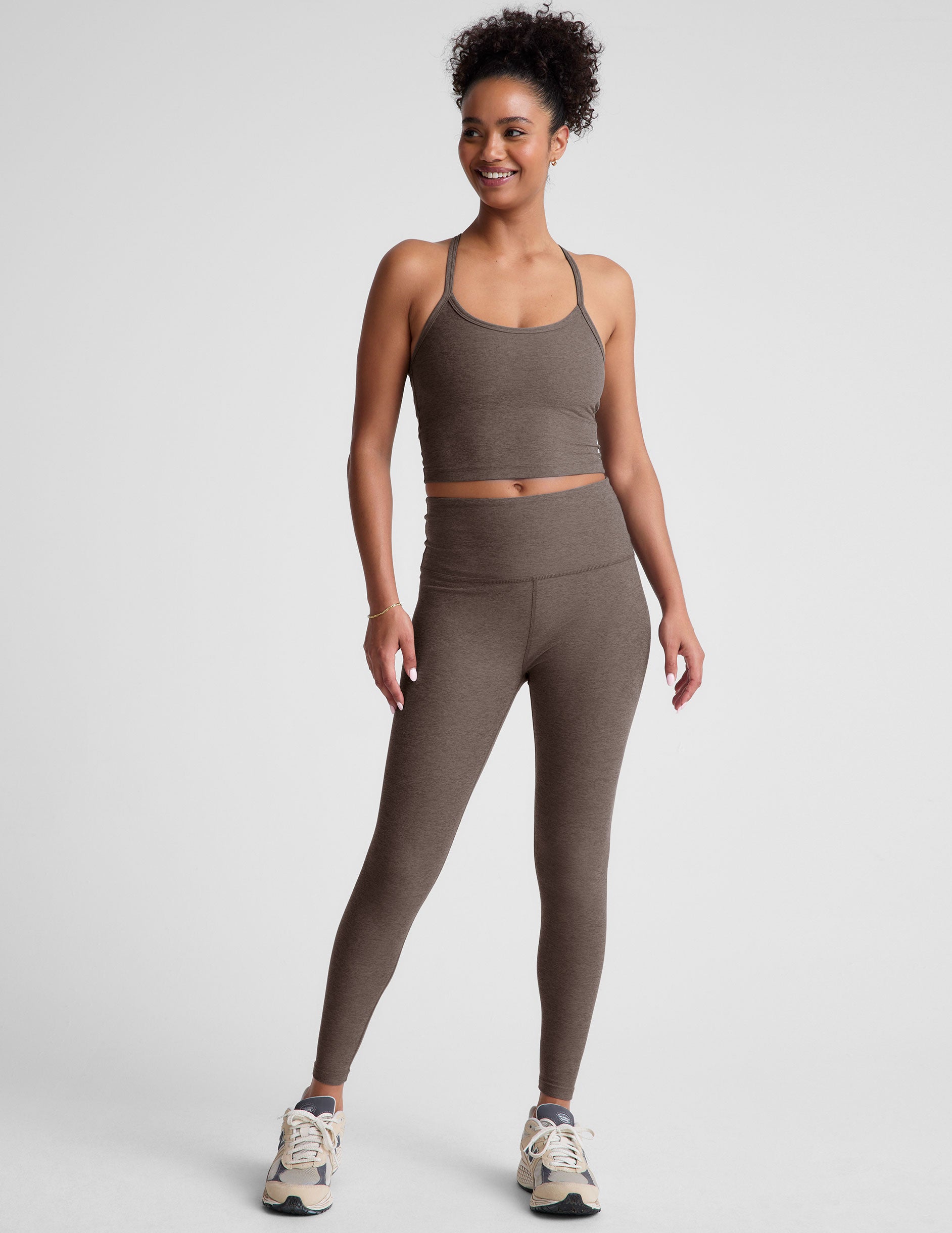 brown high-waisted midi leggings.