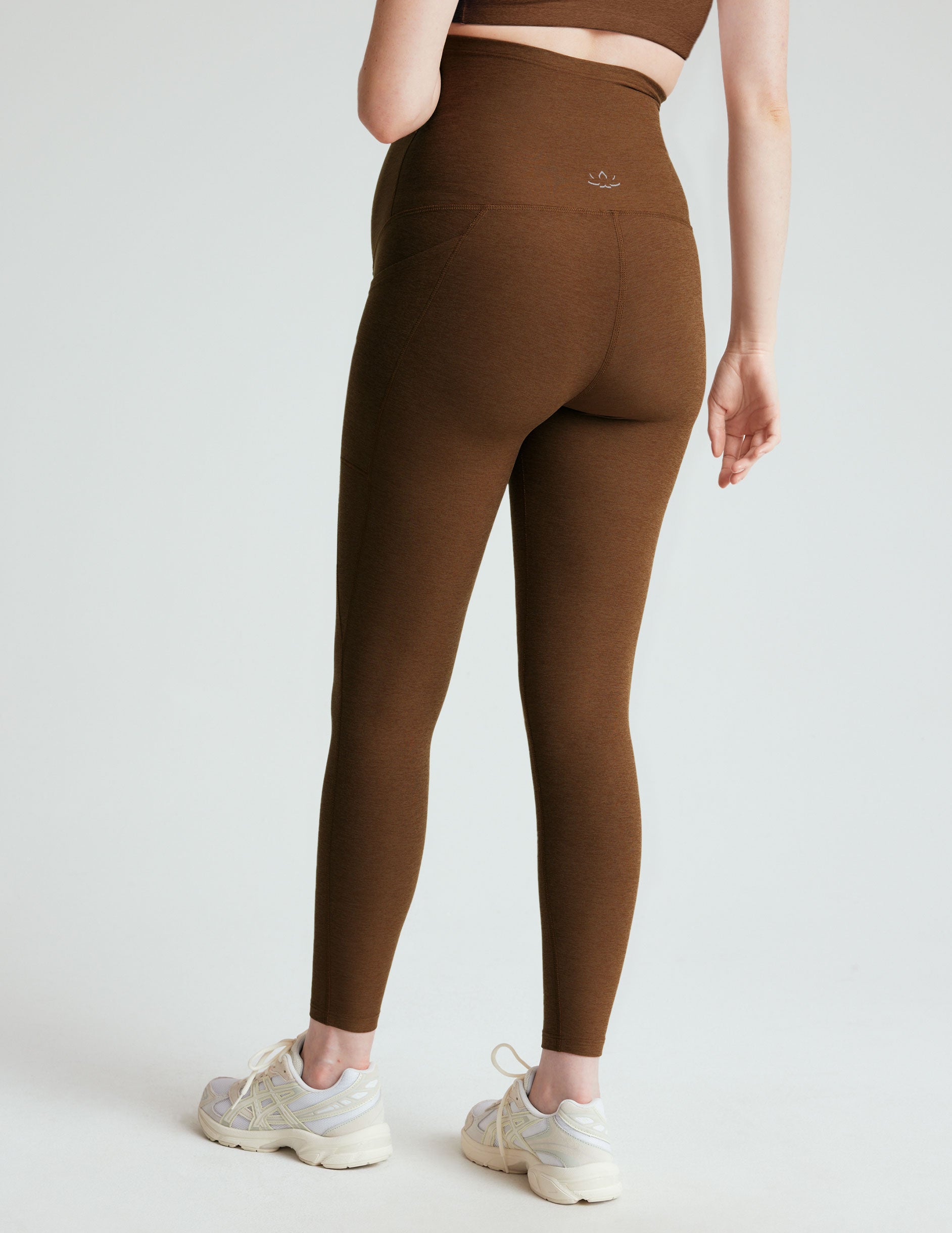 brown high-waisted maternity leggings with pockets.