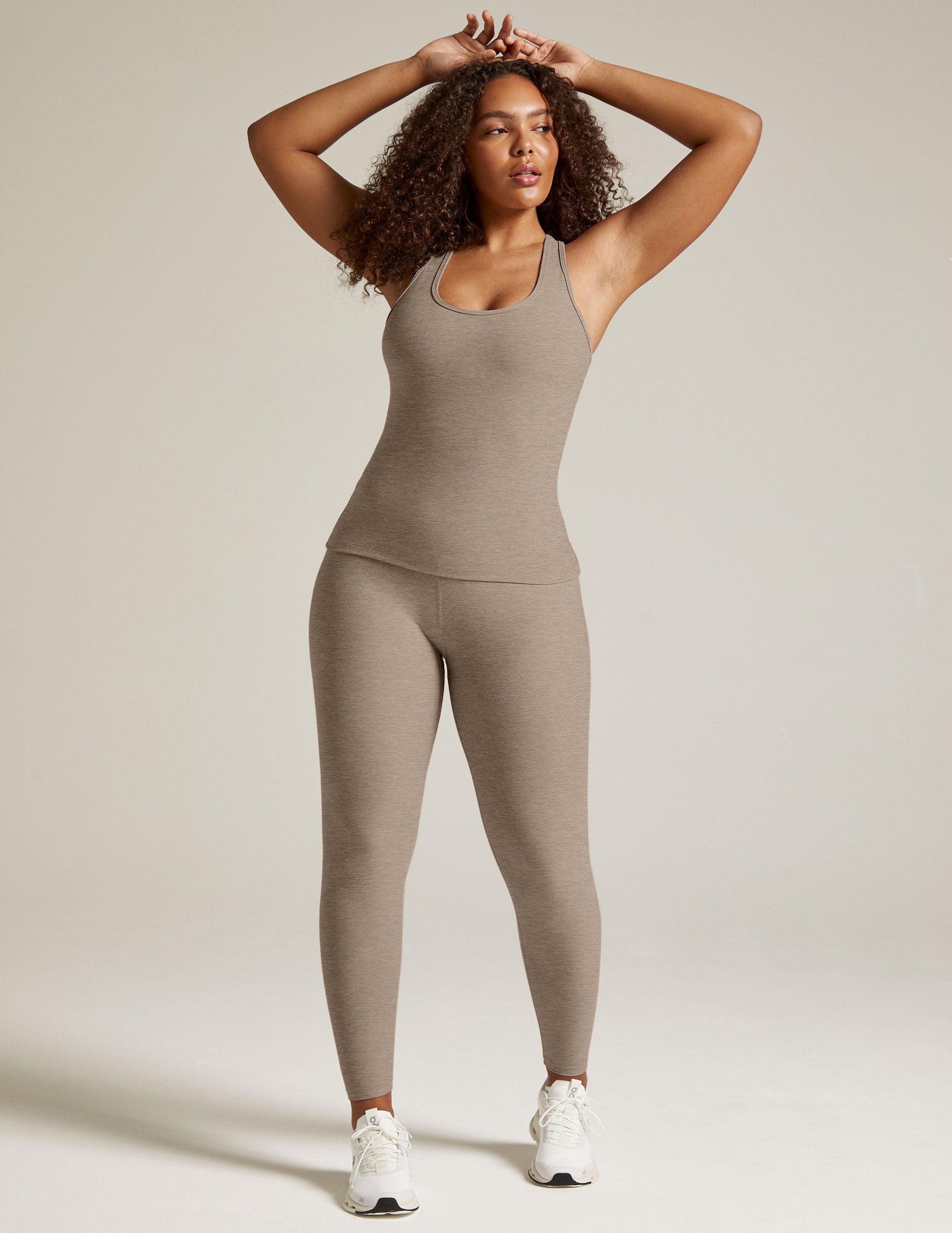 beige tank top.