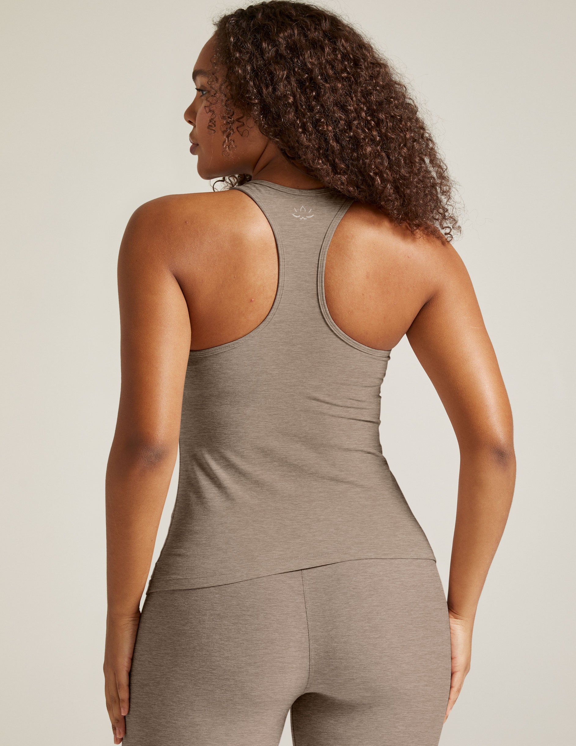 beige tank top.