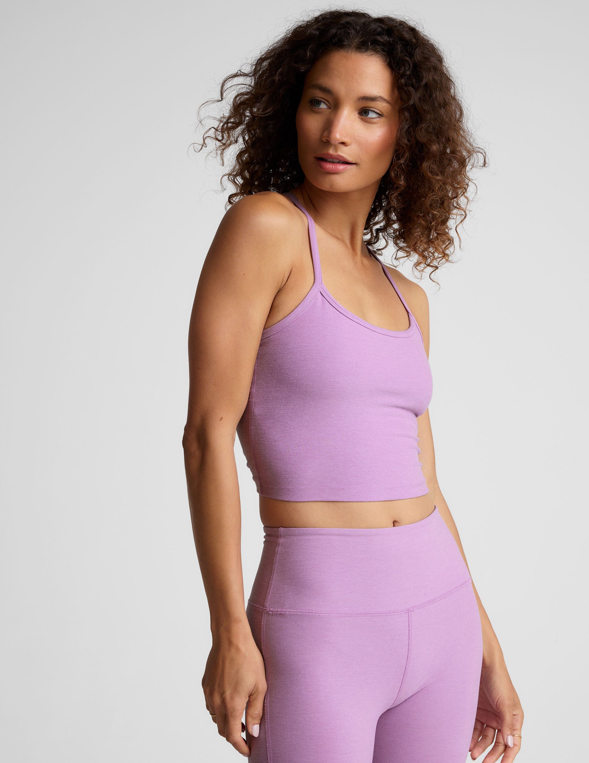 purple racerback cropped tank with spaghetti straps.