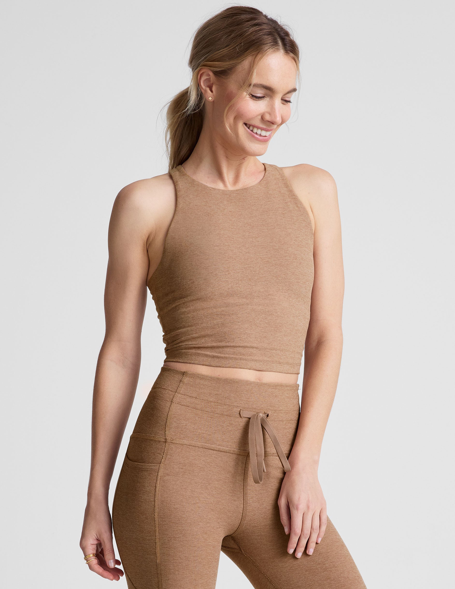 brown high-neck cropped length racerback tank top.