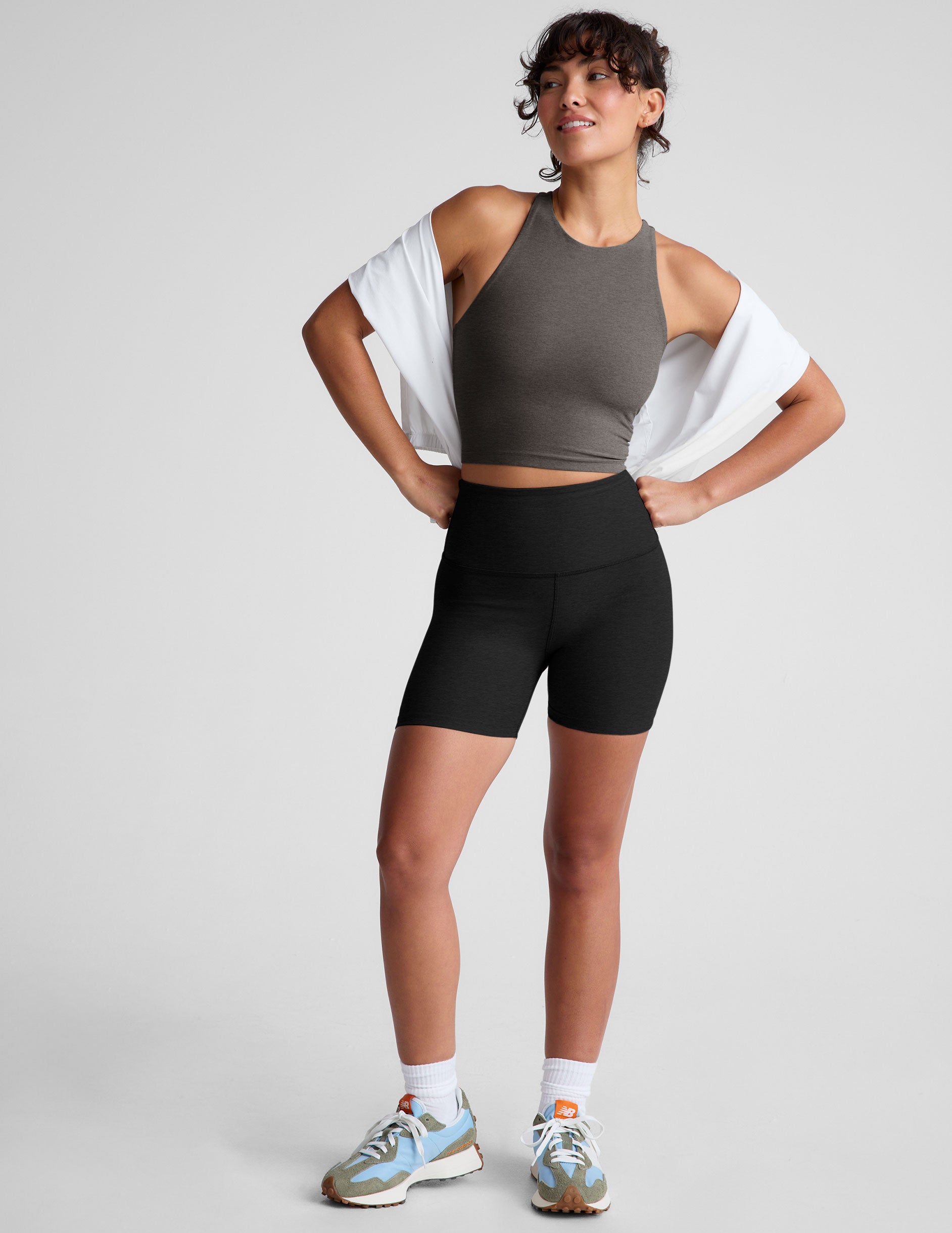 gray cropped tank top with a high scoop neckline.