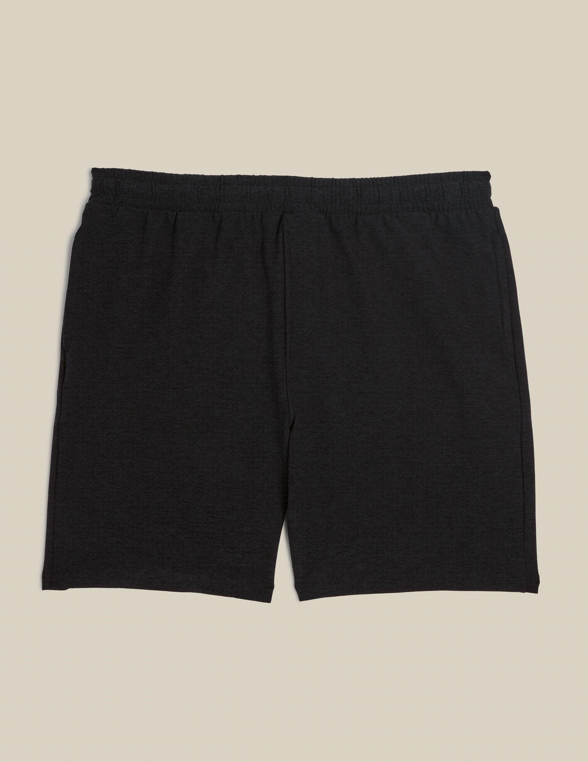 black relaxed fit men's athleisure shorts with pockets.
