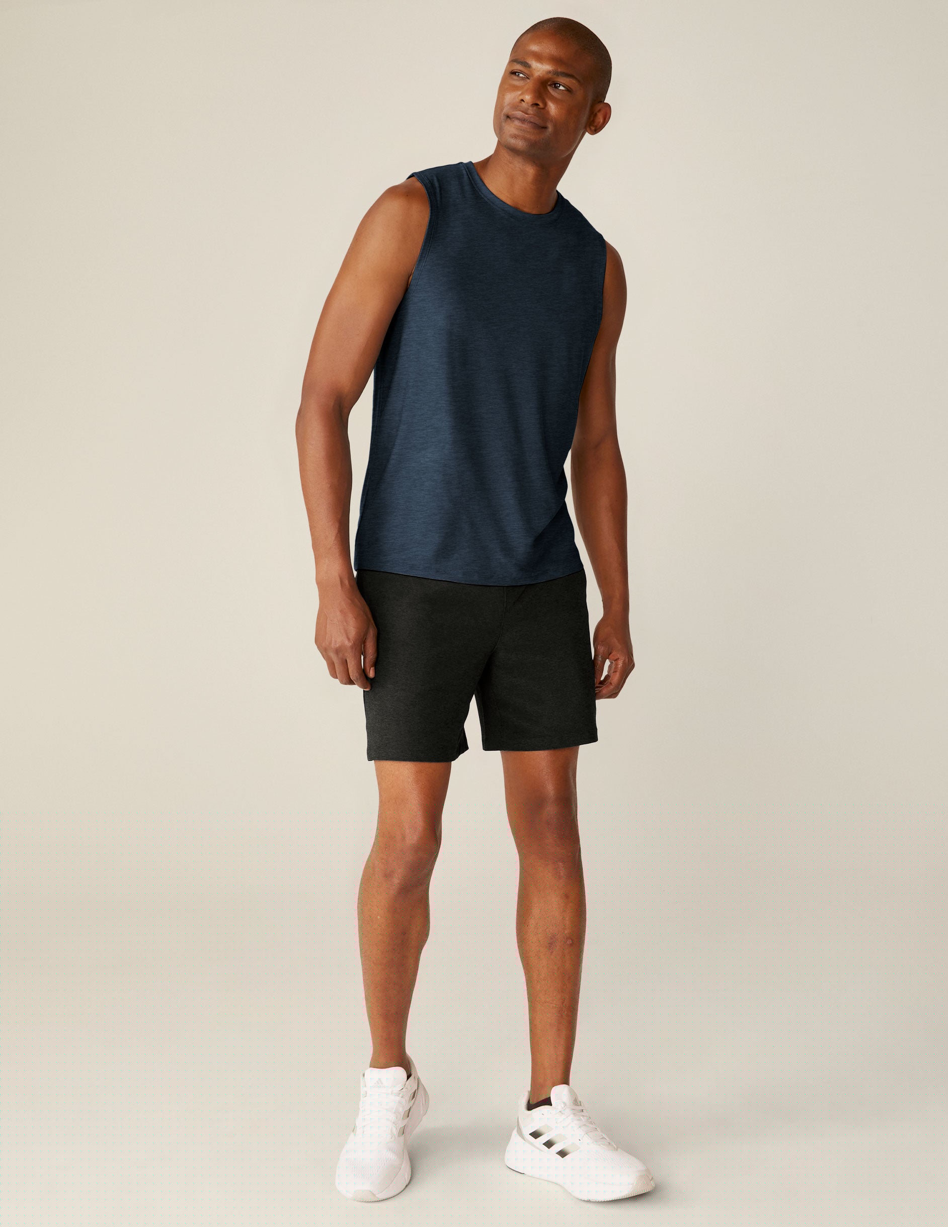black relaxed fit men's athleisure shorts with pockets.
