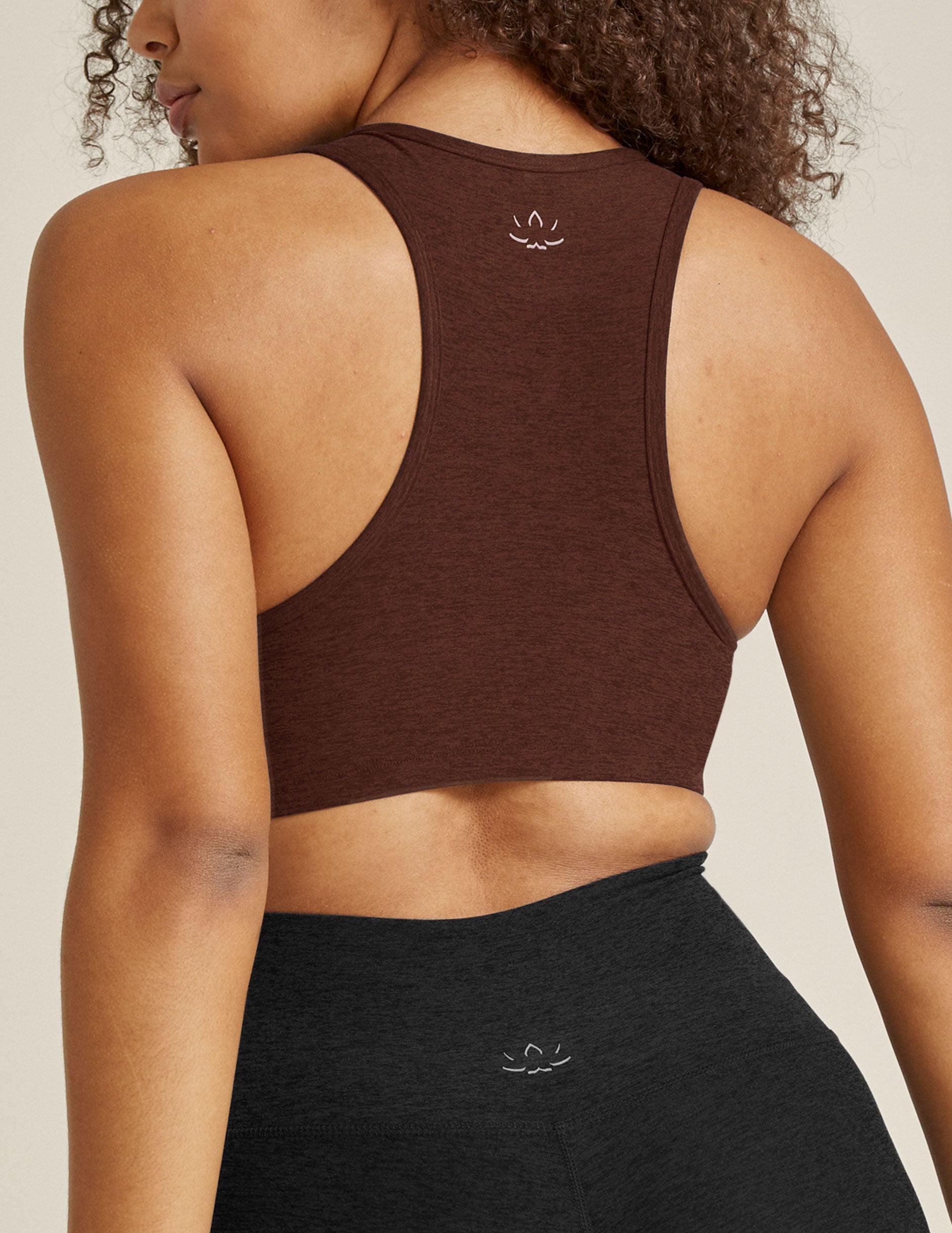 brown v-neck racerback sports bra with removable padding.