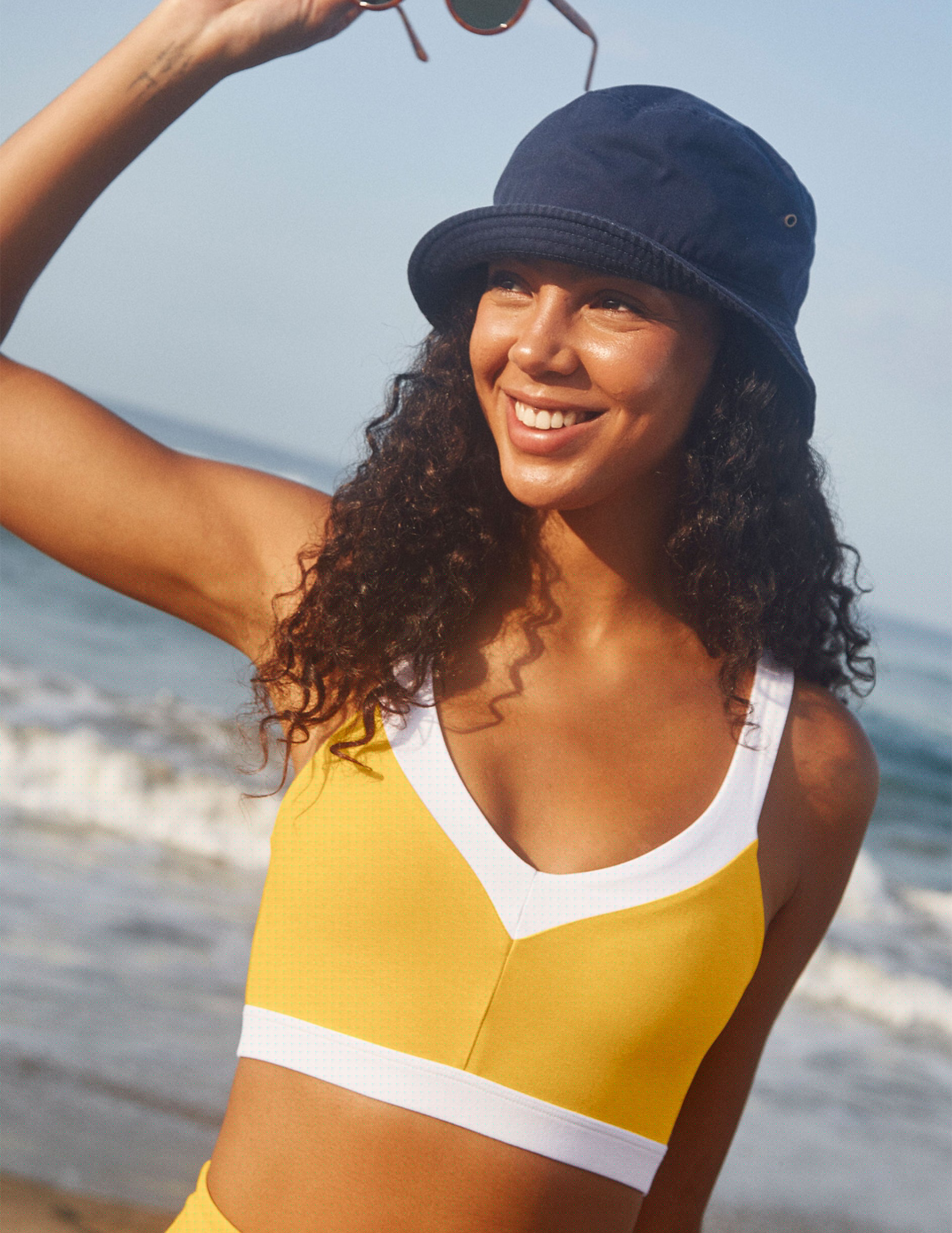 yellow spacedye bra top with white outlining.