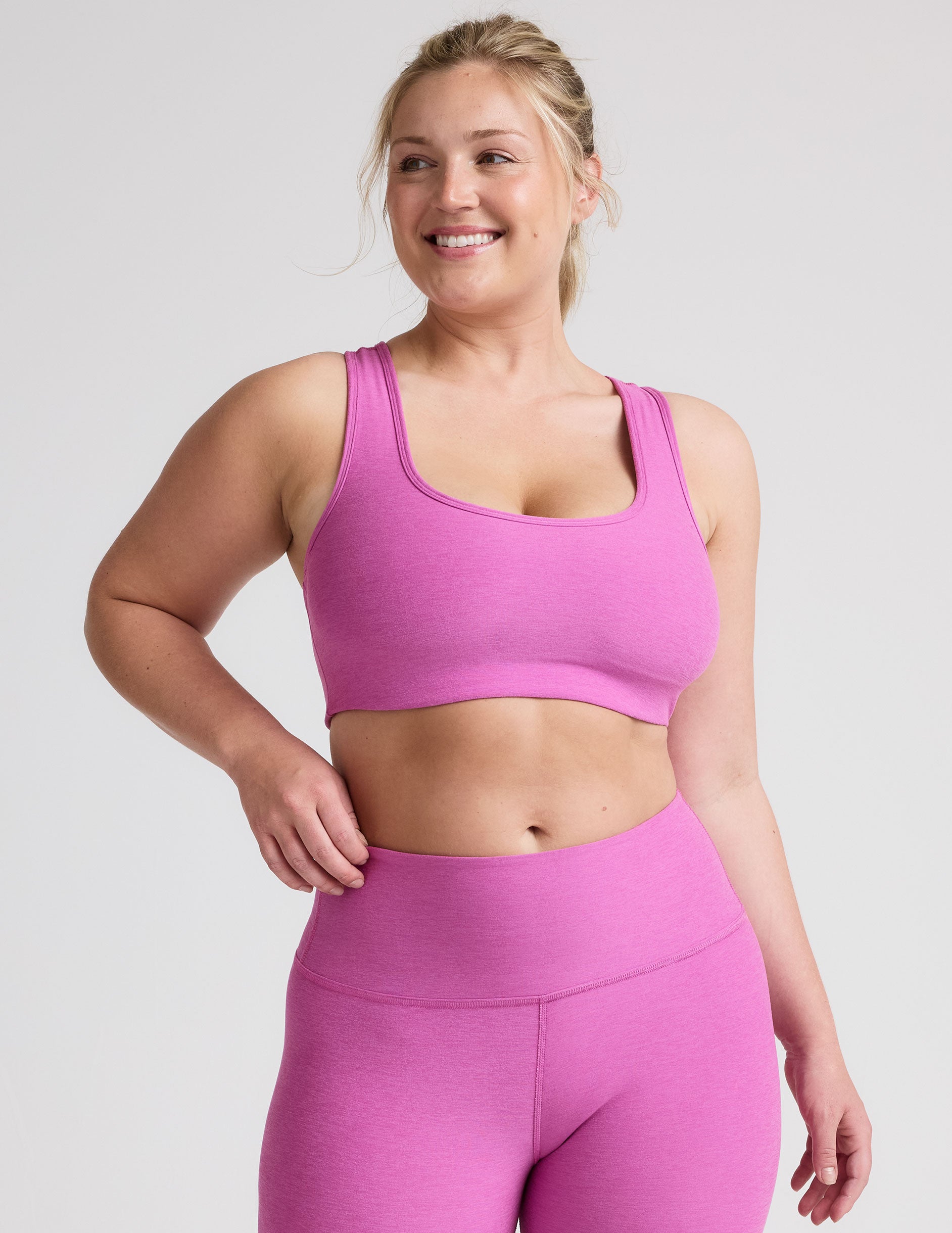 pink medium support racerback bra with a 2" hemband.