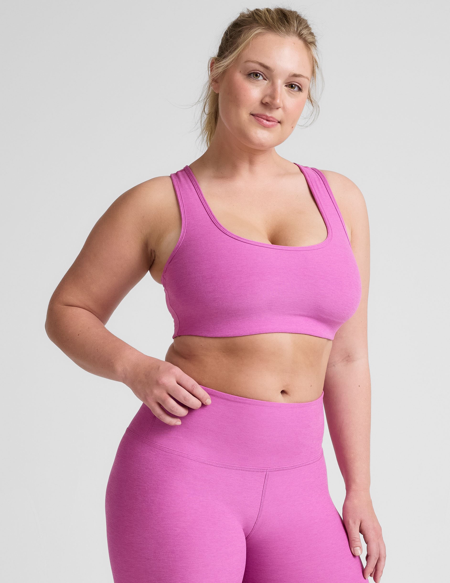 pink medium support racerback bra with a 2" hemband.