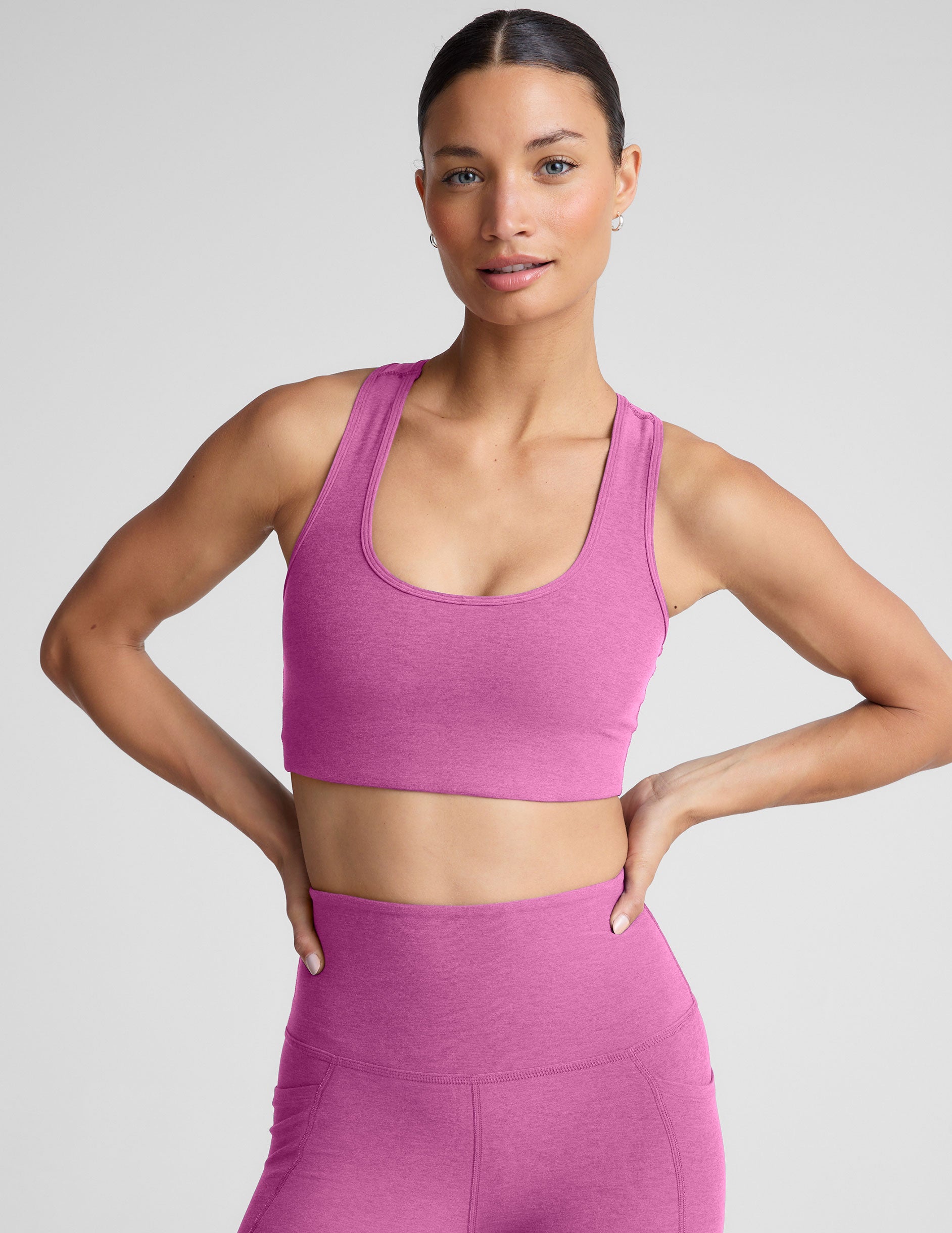 pink medium support racerback bra with a 2" hemband.