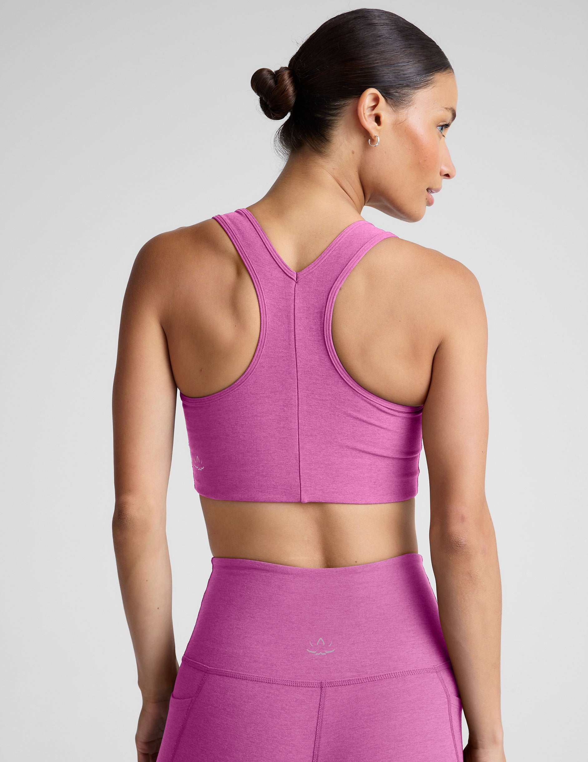 pink medium support racerback bra with a 2" hemband.