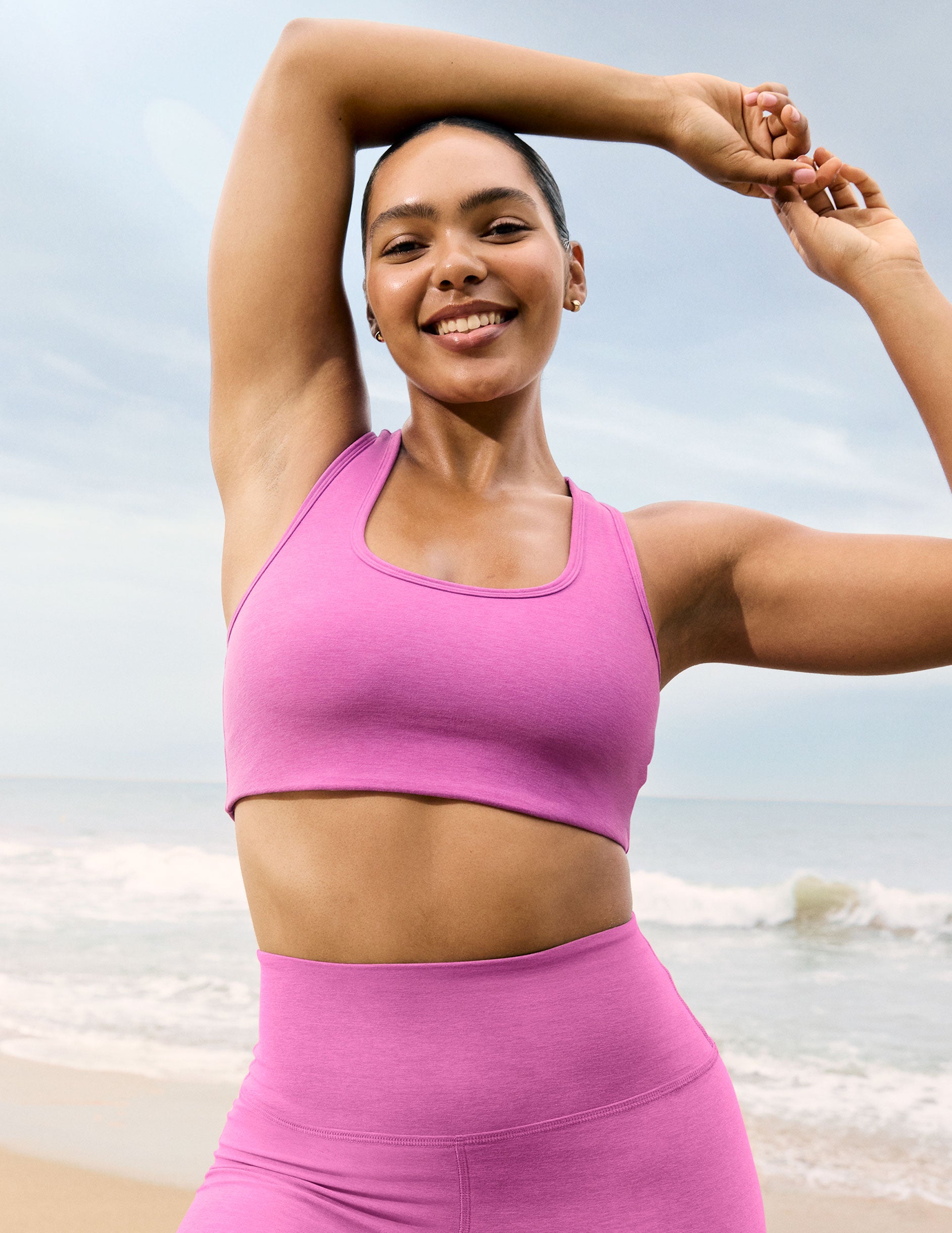 pink medium support racerback bra with a 2" hemband.