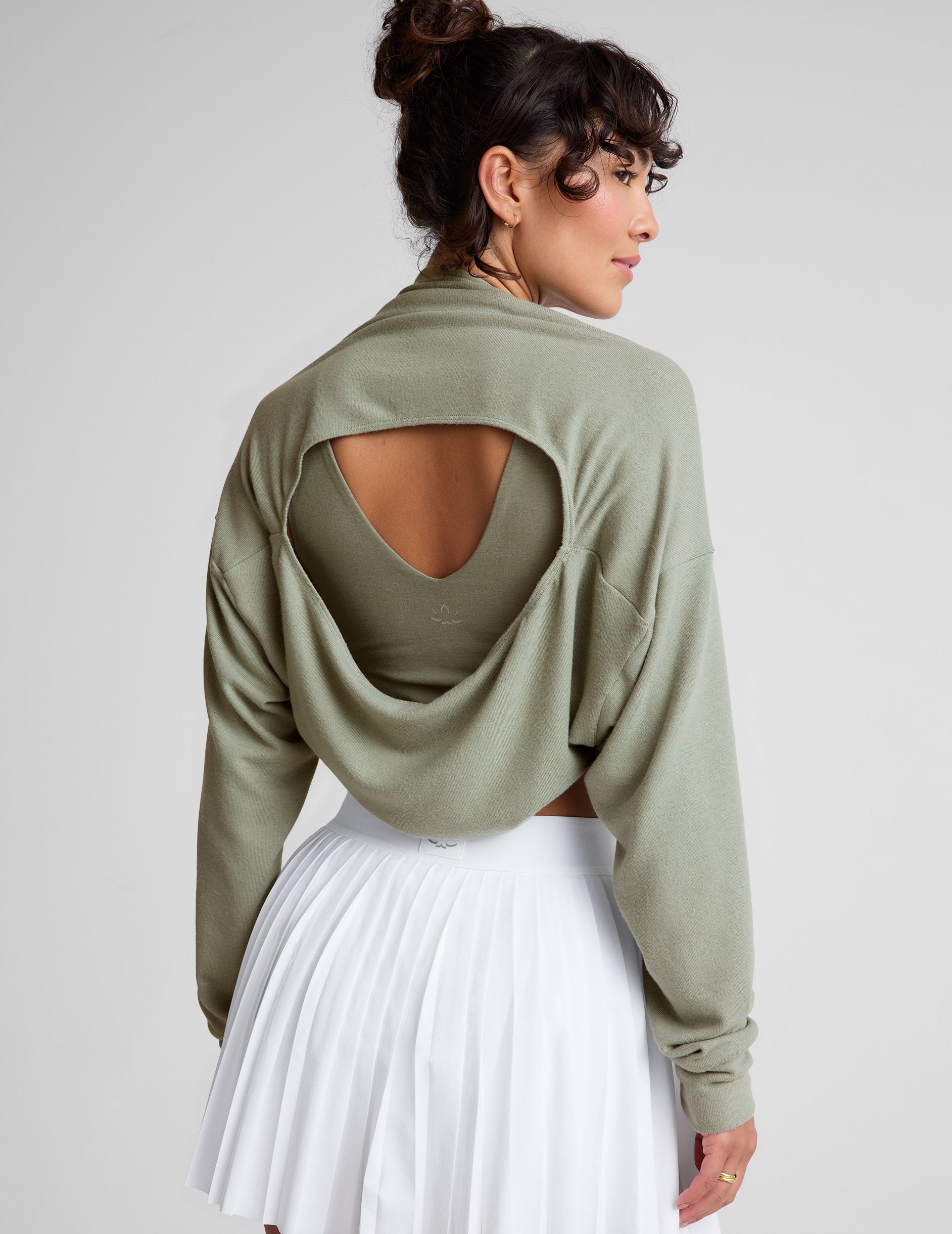 green 2-way long sleeve cropped shrug. 