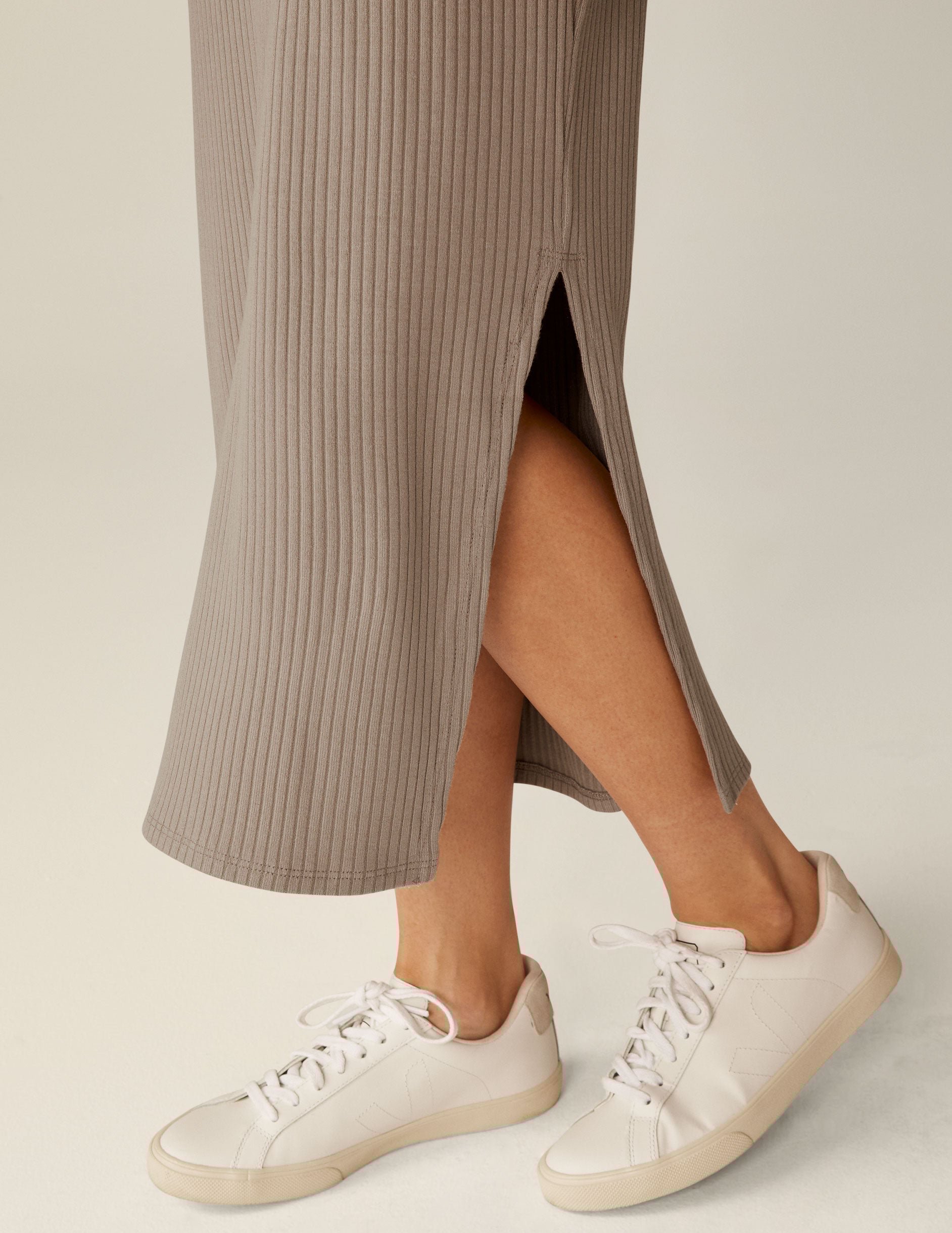 brown mock neck ribbed midi dress with a front side slit. 