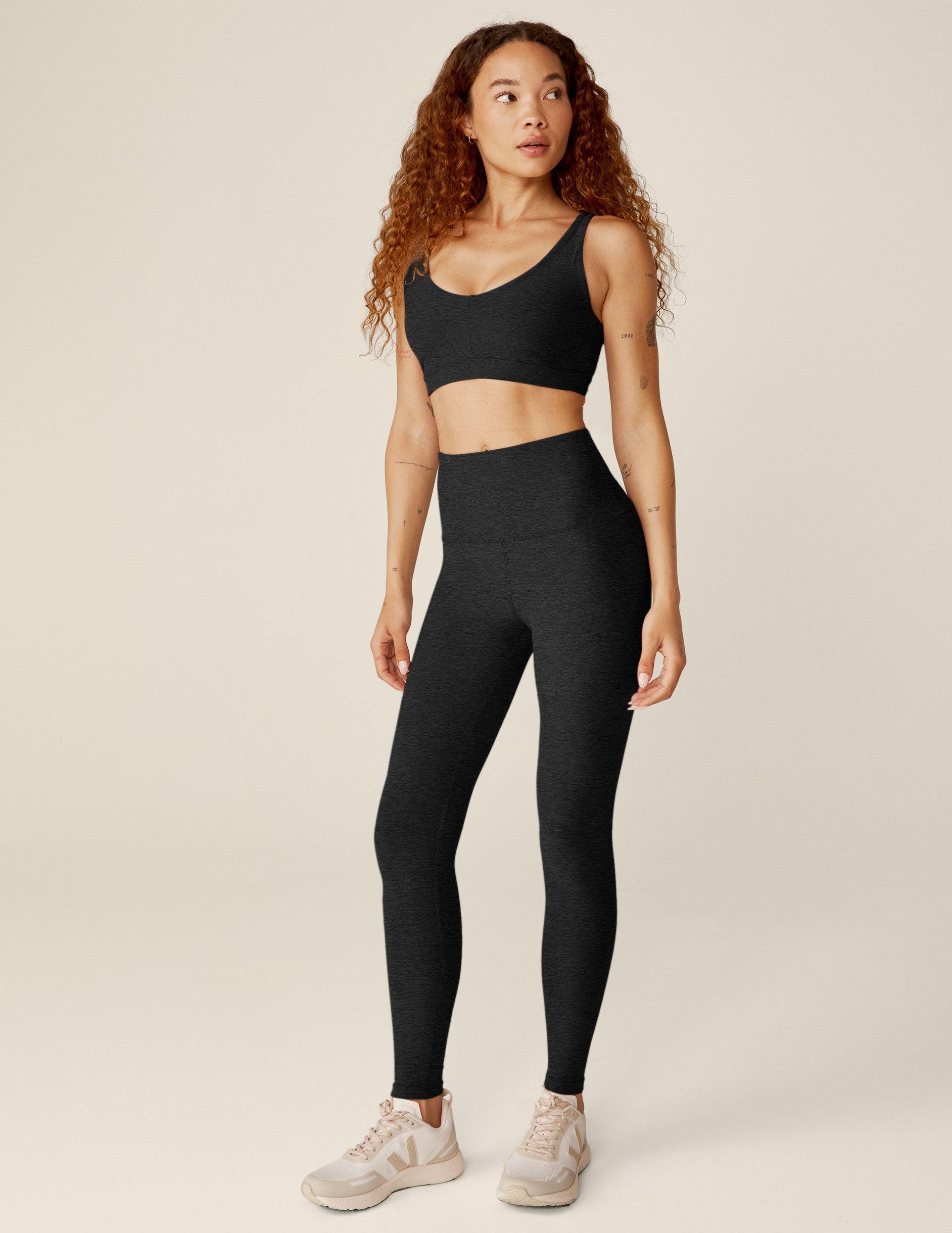 black sports bra with remove-able pads and adjusting straps. 
